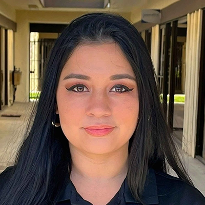 Case Manager Geovonna Casanova Smiling In Collared Shirt