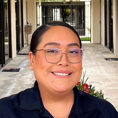 Front Desk Manager Karina Nuno Smiling Outdoors